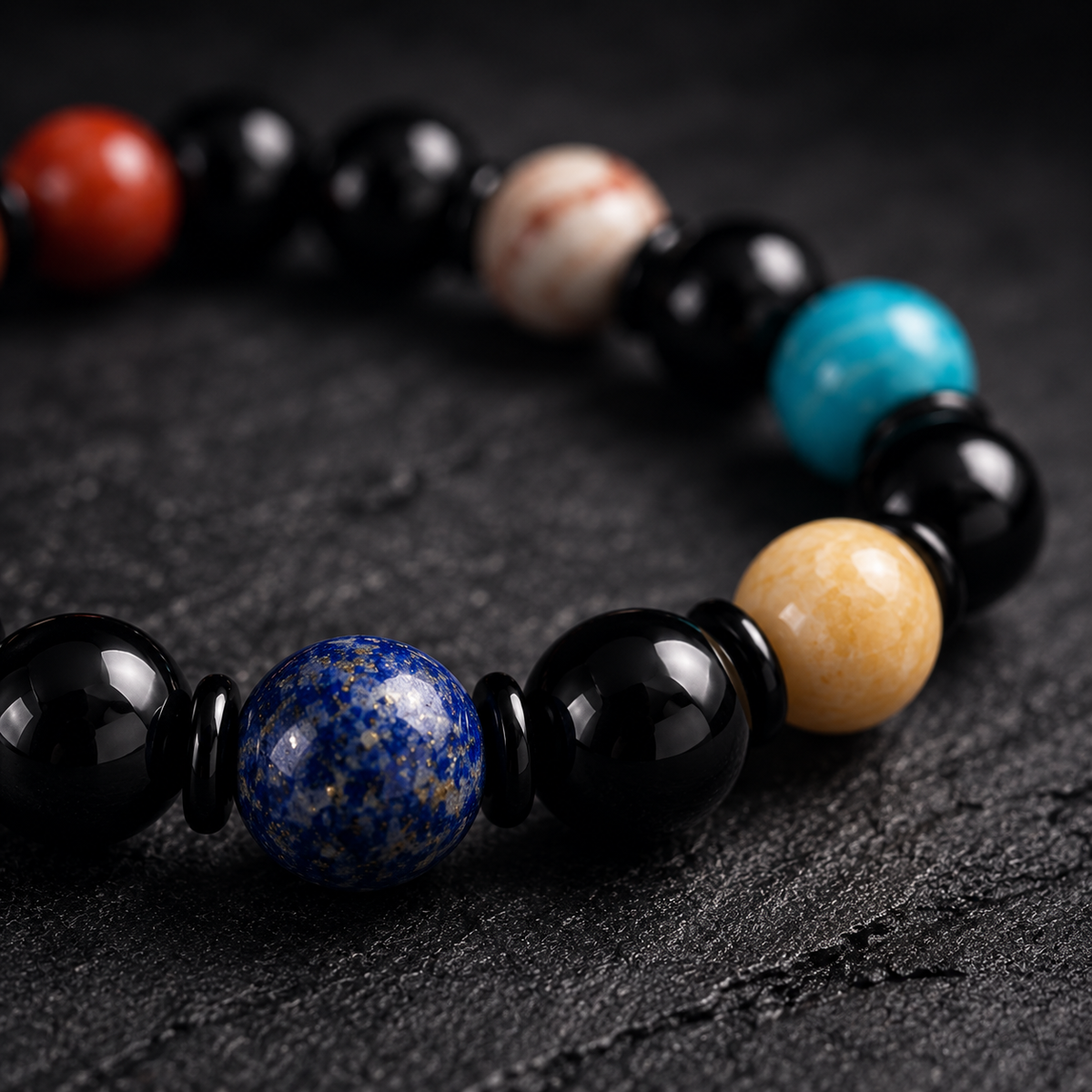 Close-up of the natural gemstone beads and black spacer rings